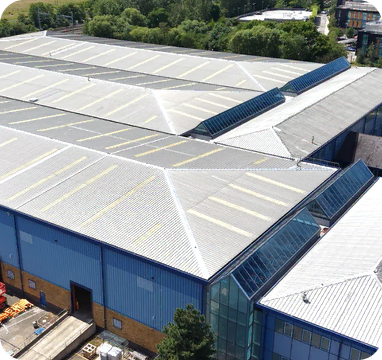Aerial view of a large modern warehouse facility supporting contract packing and logistics operations